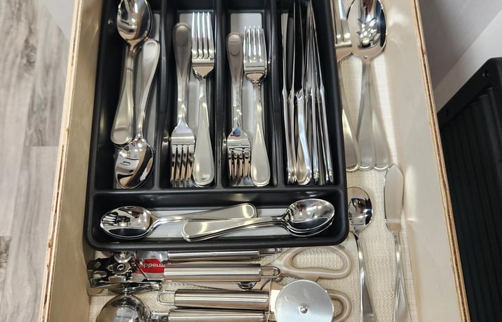 Silverware drawer under sink