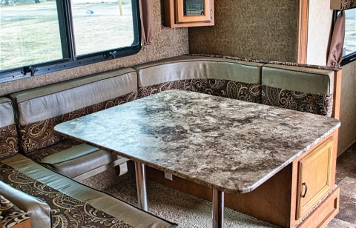 Dining table that seats 6 comfortably and transforms into a bed