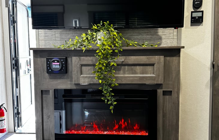 Beautiful fireplace, surround sound and TV complete with streaming channels.