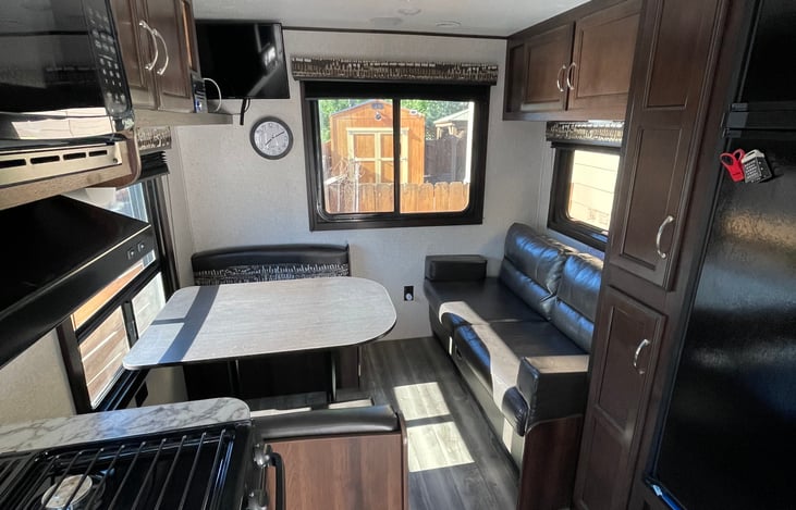 Super efficient and well laid-out kitchen, dinette, sofa area with plenty of storage for games, movies, and dry foods.