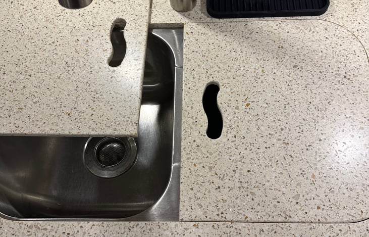 Double sink within cover.