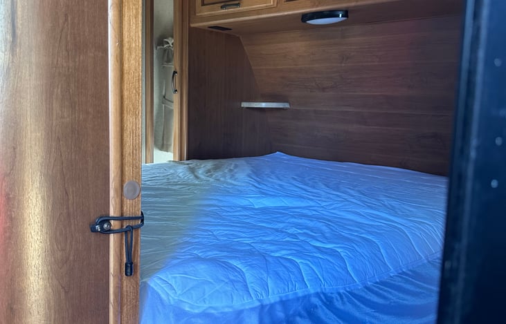 Main Bed from right side - shelf and outlet in corner on bothsides