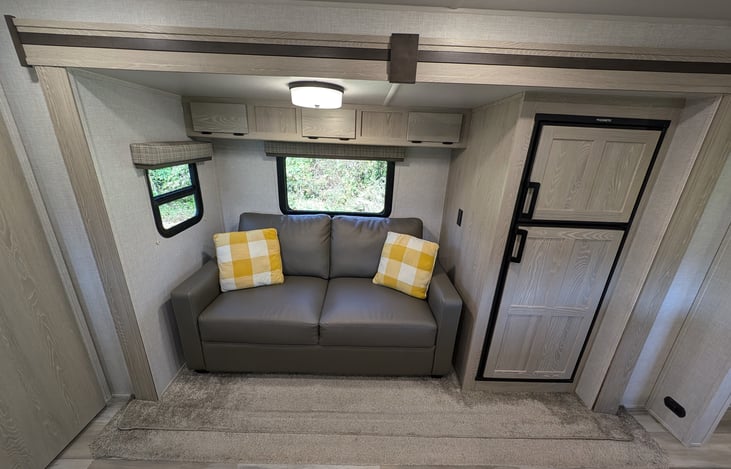 Perfect couch for movie nights, large fridge