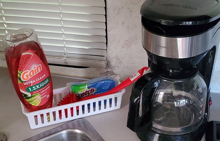 Cleaning supplies & Coffee pot