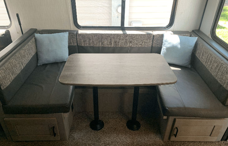 Folds down into a bed - sleeps 1 adult comfortably or two small children