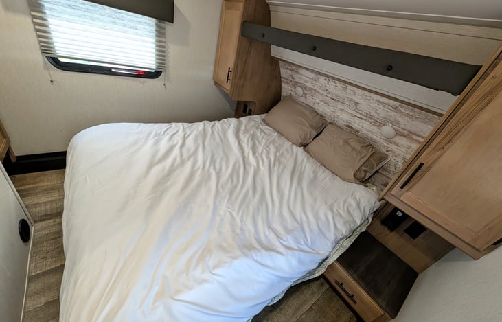Cozy front bedroom with ample storage.