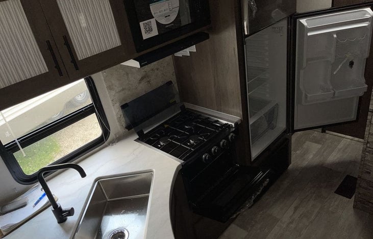 Please  make sure fridge lock is engaged before  traveling.