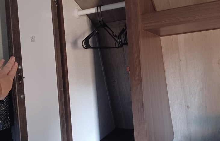 Closet space on both sides of master bed.