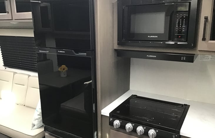 Refrigerator, cook top, and microwave/convection oven