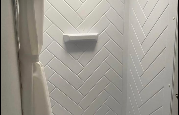 Single shower and bathroom