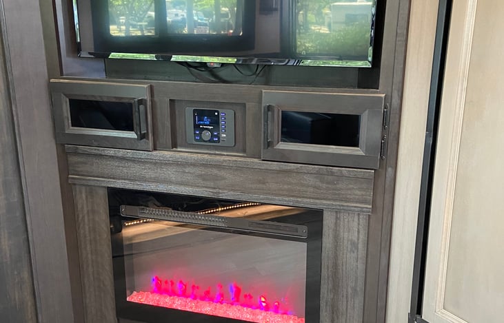 -Fireplace provides plenty of heating. Central heating also available.
Bluetooth stereo connected to indoor and outdoor speakers.