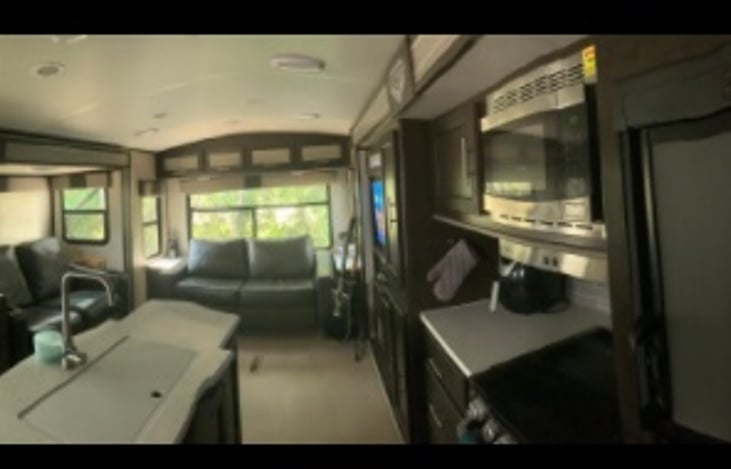 From the kitchen to the living area with a lot of natural light!