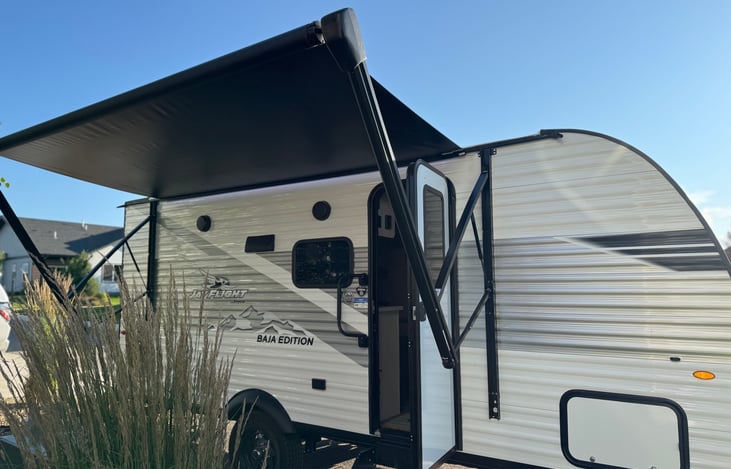 Power awning with under lights