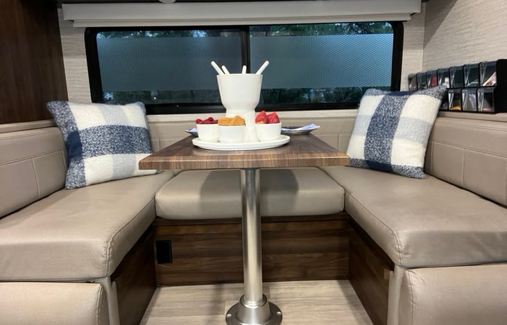 Table swivels to seat 4 comfortably.