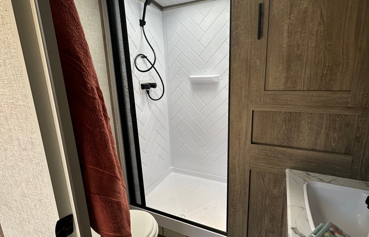 Spacious bathroom with walk-in shower