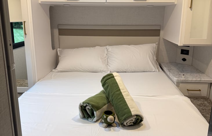 Private bedroom with queen size bed.