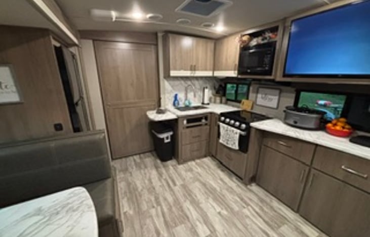 Kitchen comes fully stocked with dishes, cook ware, etc. You just need to bring your own food and drinks! Roku TV and cable hook up (where available at camp grounds).