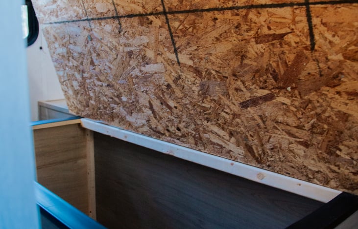 Large storage compartment under queen bed.