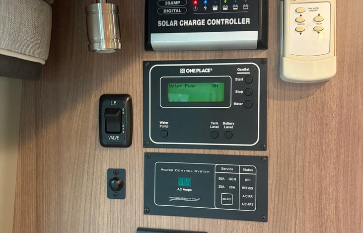 Control panels
Truma hot water heater, tank levels, generator start/stop, solar