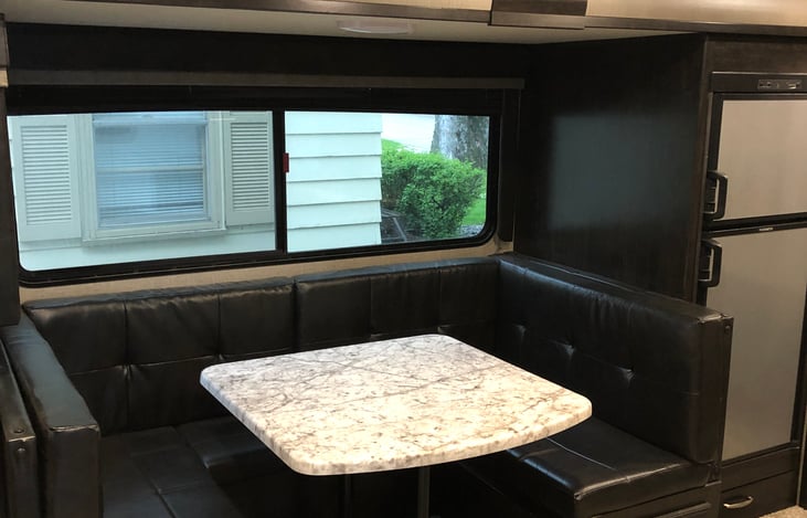 Kitchen table folds down into a Full size bed