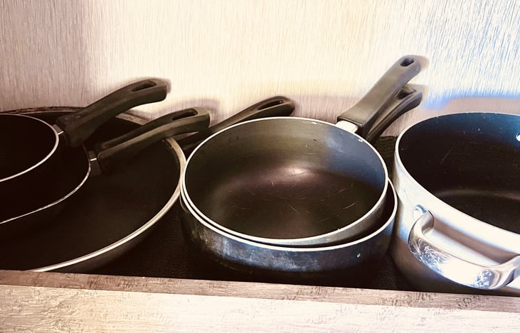 large pot, large skillet, 2 medium skillets, 2 smaller skillets, and small pot included in every rental.