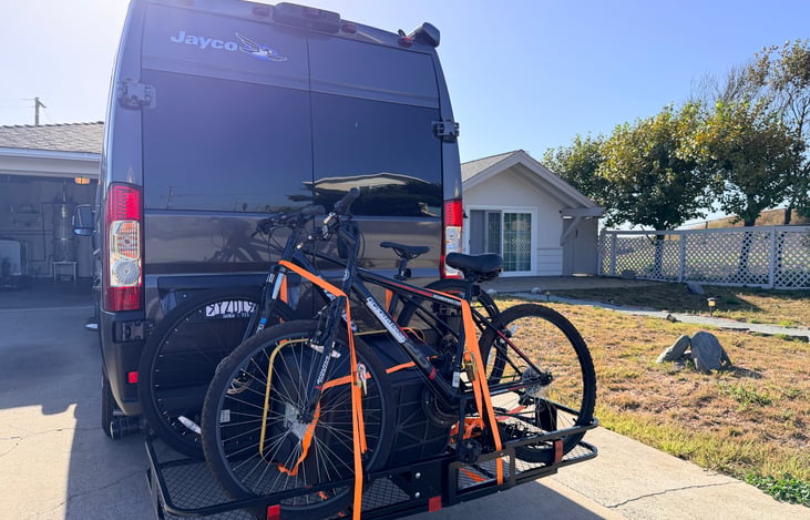 Tow-hitch cargo rack available for rent. Large enough to hold two bikes, and 2 storage bins (also available for rent).