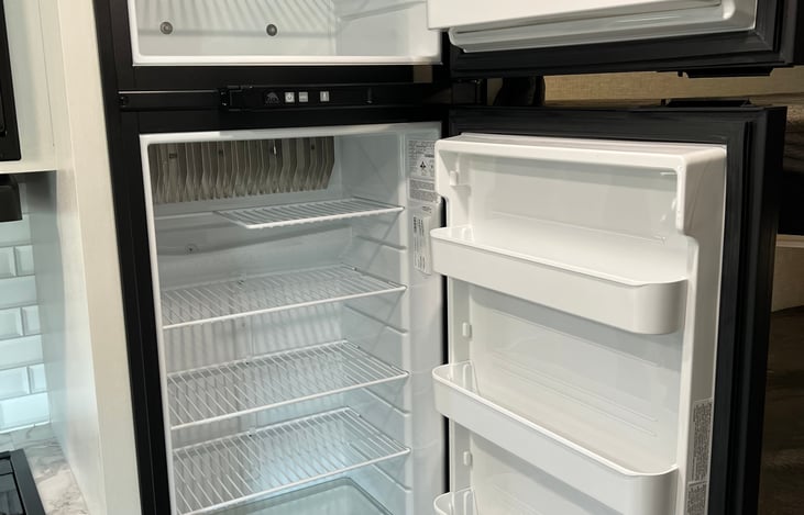 Automatic Fridge and Freezer cools on propane or electric.