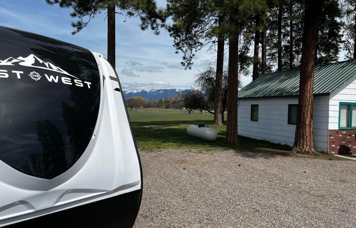 We live in the white house beside the RV.