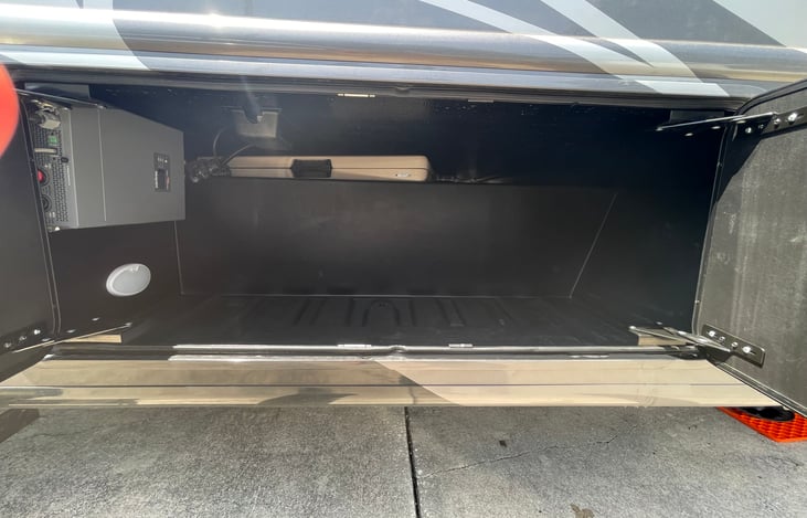 3 full size compartments for carrying your stuff. Folding table and 4 camp chairs included!