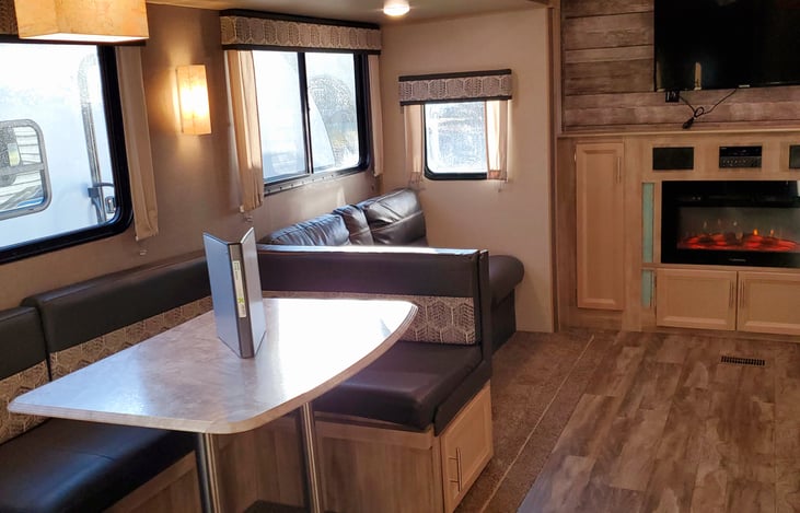 Collapsible dinette for additional sleeping