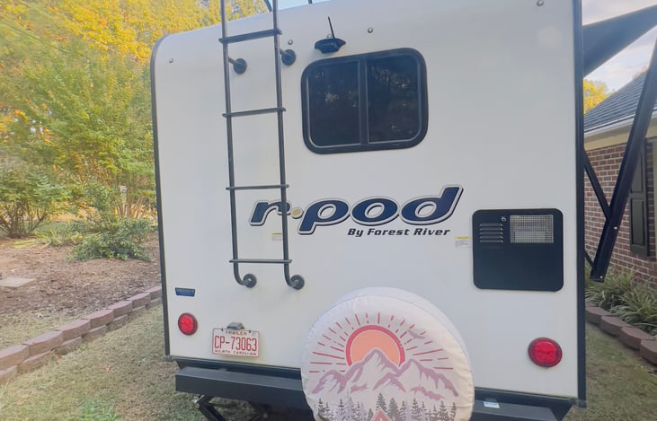 Camper is equipped with rear and side cameras (display is through a screen that mounts to your tow vehicle's dash while driving.)