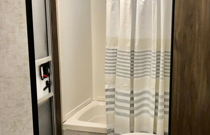 Shower with tub, great for the little ones!