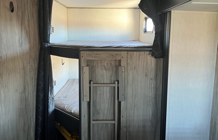 Massive double bunks! Complete with separate USB ports, outlets, lighting, and windows.