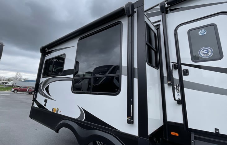 Slides have windows and same exterior finish as the RV