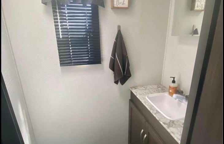 Back bathroom, sink and toilet