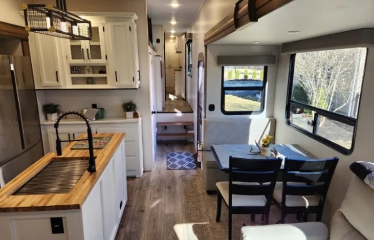 kitchen and dinning and hallway to bedrooms and bathroom