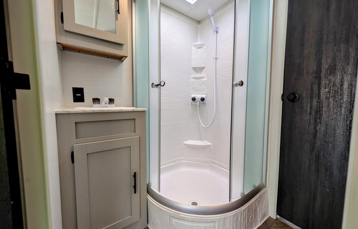 Nice bathroom with large shower feels just like at home.