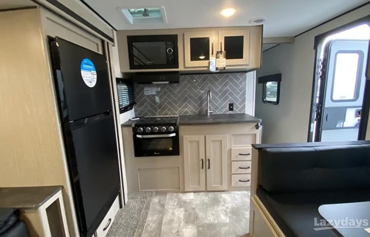 View of Kitchen and entry door