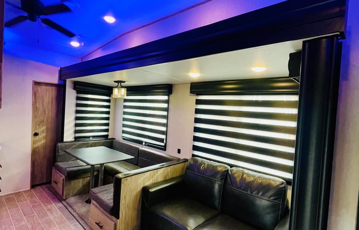 6’4” Slide Room Height (Main Level Floor Slides) with Oversized Panoramic Windows. Zebra Shades” (Light Filtering with Blackout Capability) In Main Living Area. Dual Port USB Charging Stations