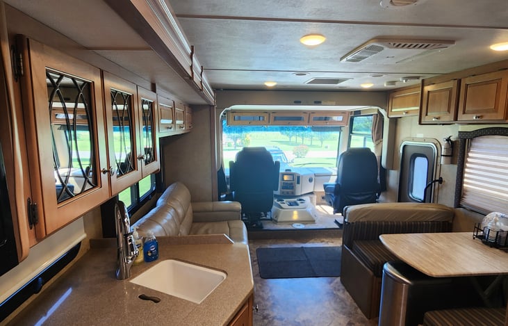 Drop down bed located above drivers seat.  Sets up in seconds.