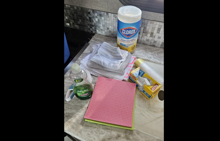 Garbage bags (small & big), cleaning wipes, Dish Soap, Brush, Bucket