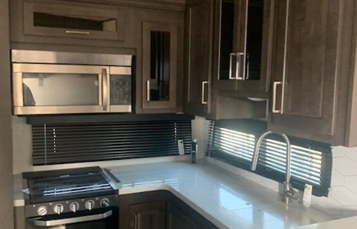 Kitchen - Microwave, Oven, Counter and Sink