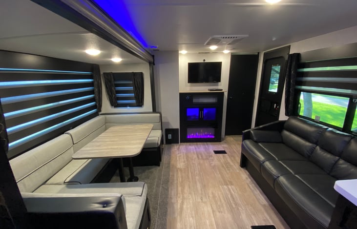 We took out the folding couch and replaced it with 2 rocking recliner chairs.