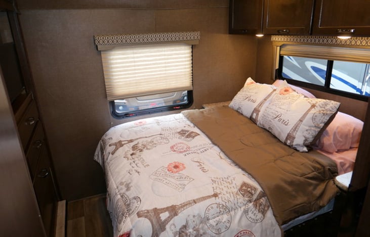 Comfy queen size bed in back