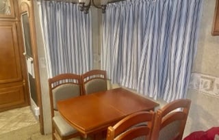 A 5th wheel travel trailer suited for 2 people