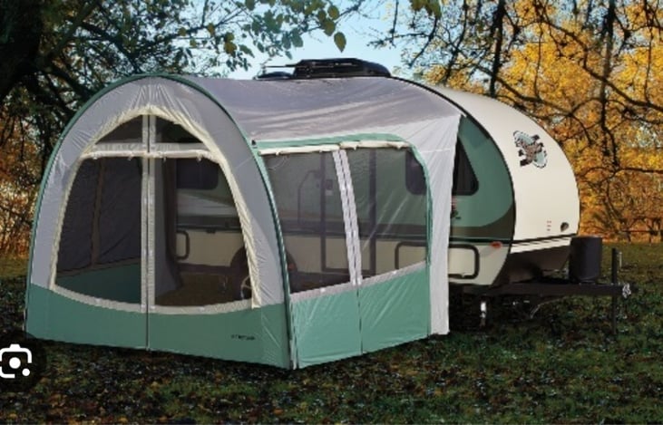 This is an example of the tent that slides onto the RV. It's nice for shade, but it isn't bug proof.