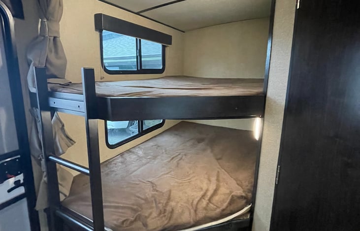 The bottom bunk can also fold up for additional storage. Perfect for storing bikes!