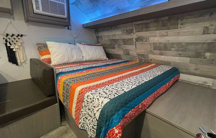 This queen sized bed has a brand new very comfortable mattress! The led light strip above the bed can be changed to any color you want and you can easily turn it off if you do not want any light.