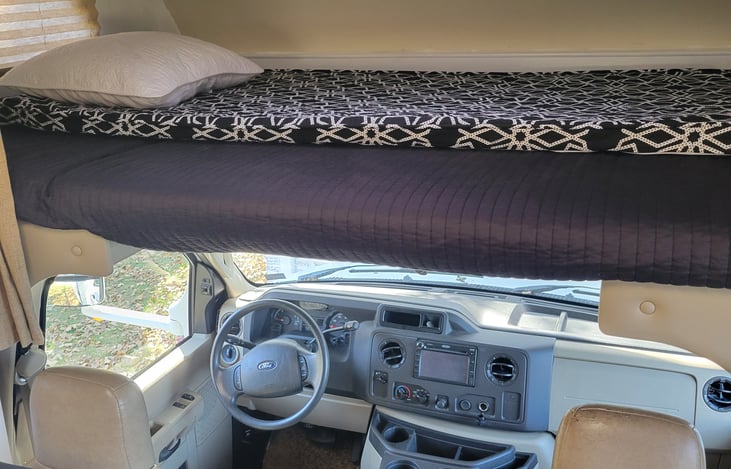 Cozy sleeping area / children's hangout above the cab