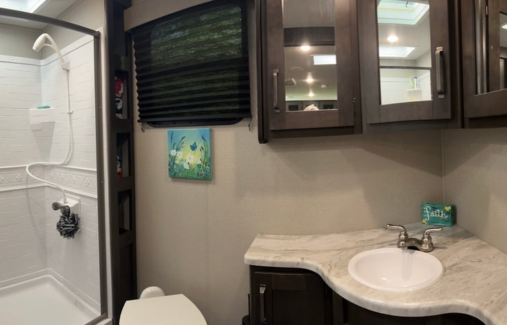 Large bathroom with shower.